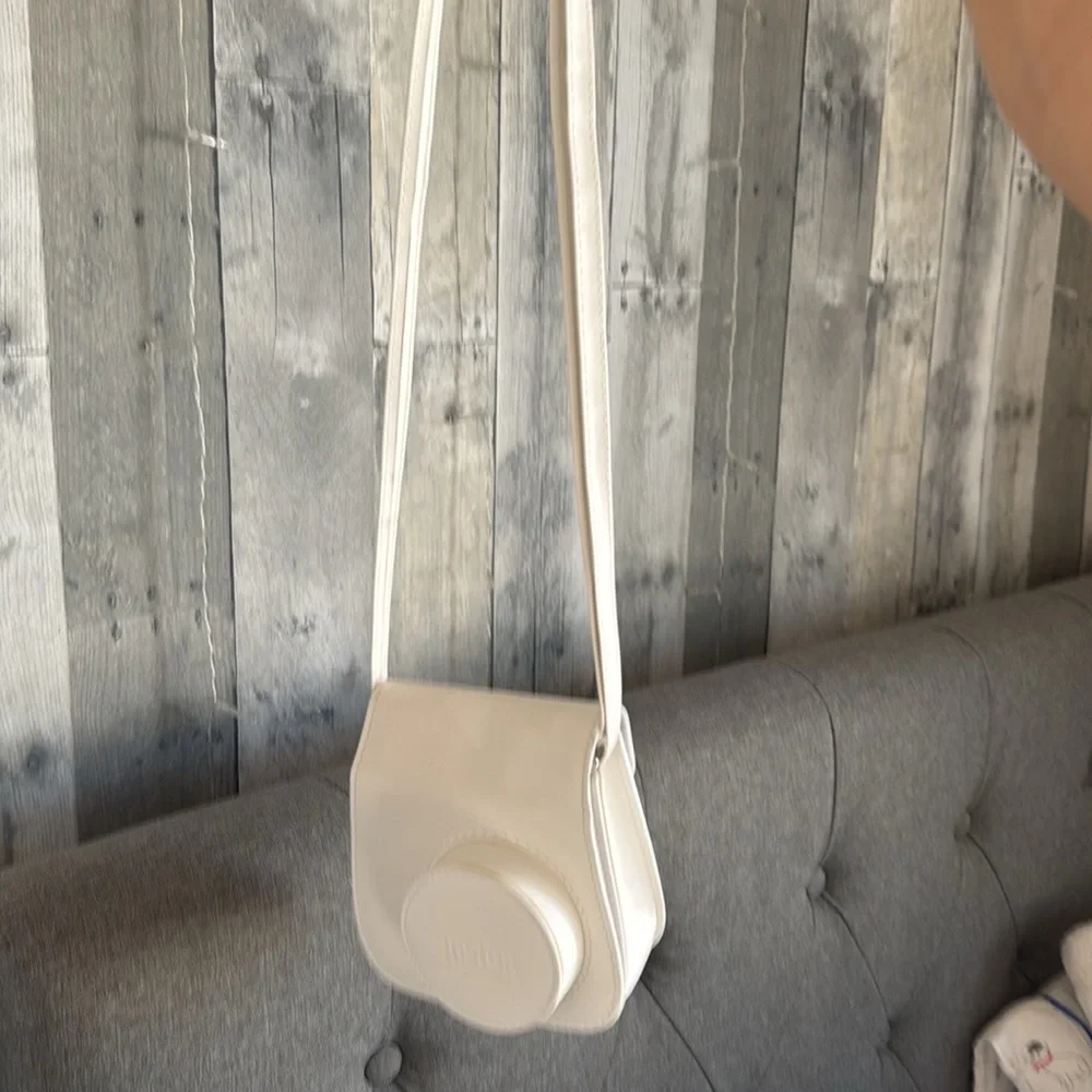 Fujifilm instant camera + case/bag